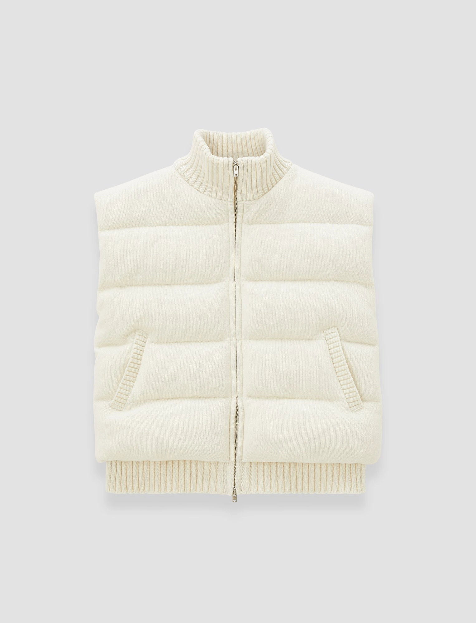 Knitted Down Puffer Gilet fireplace