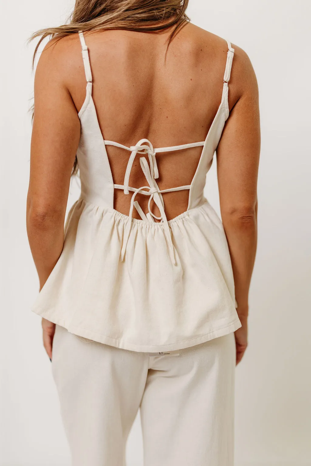 Keira 100% Cotton Bow Trim Peplum Top in Cream FlexibleLayeredConstruction Quick Dry Feature