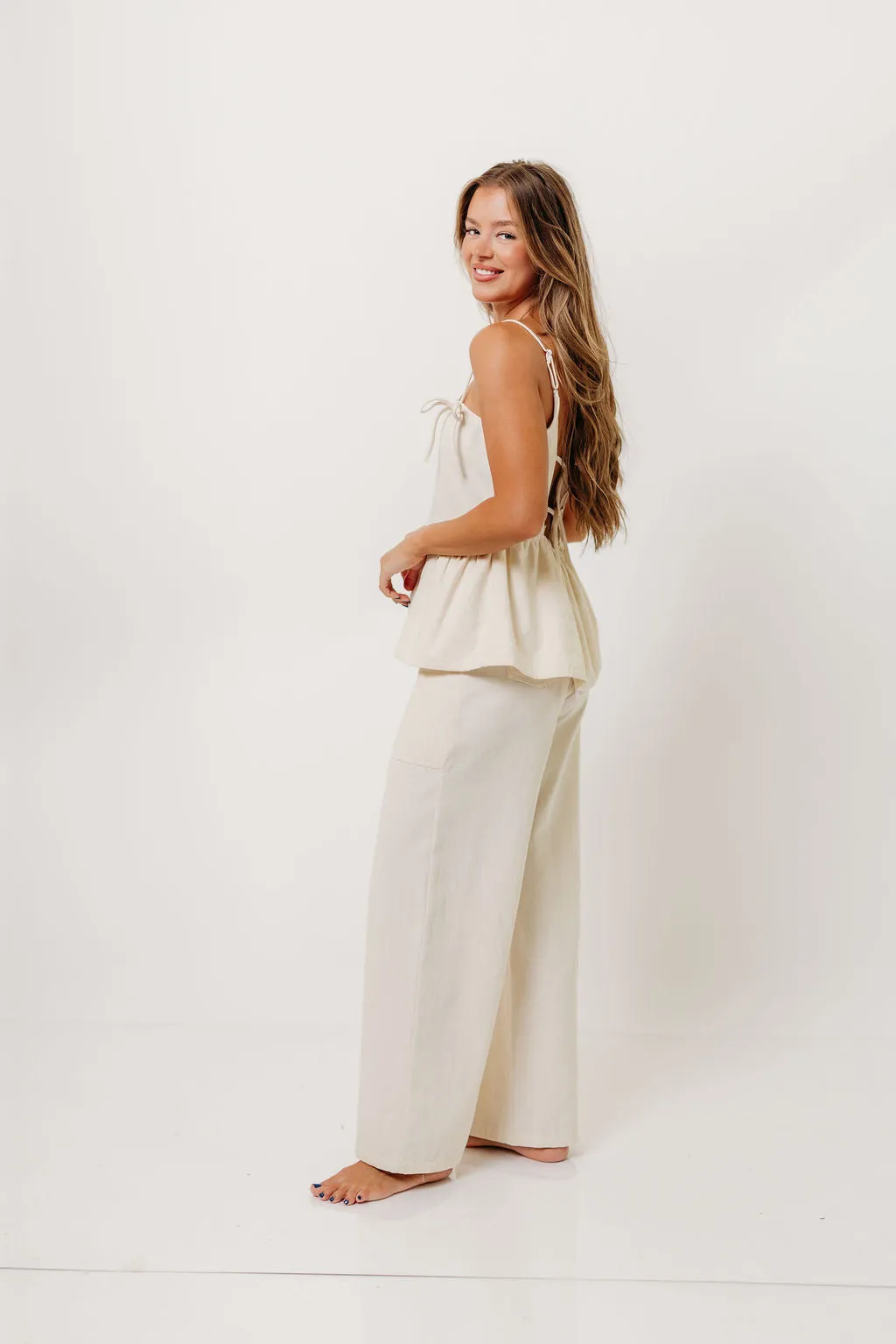 NoRoll Hem Technology Reinforced Shoulder Panels Keira 100% Cotton Bow Trim Peplum Top in Cream